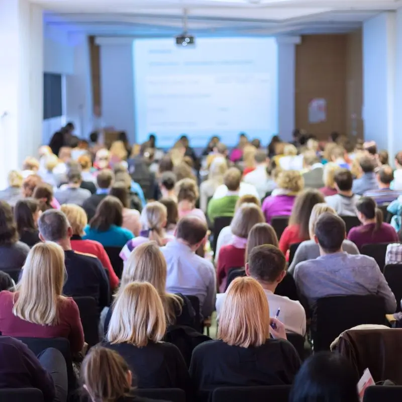 A group of audience listening to a talk